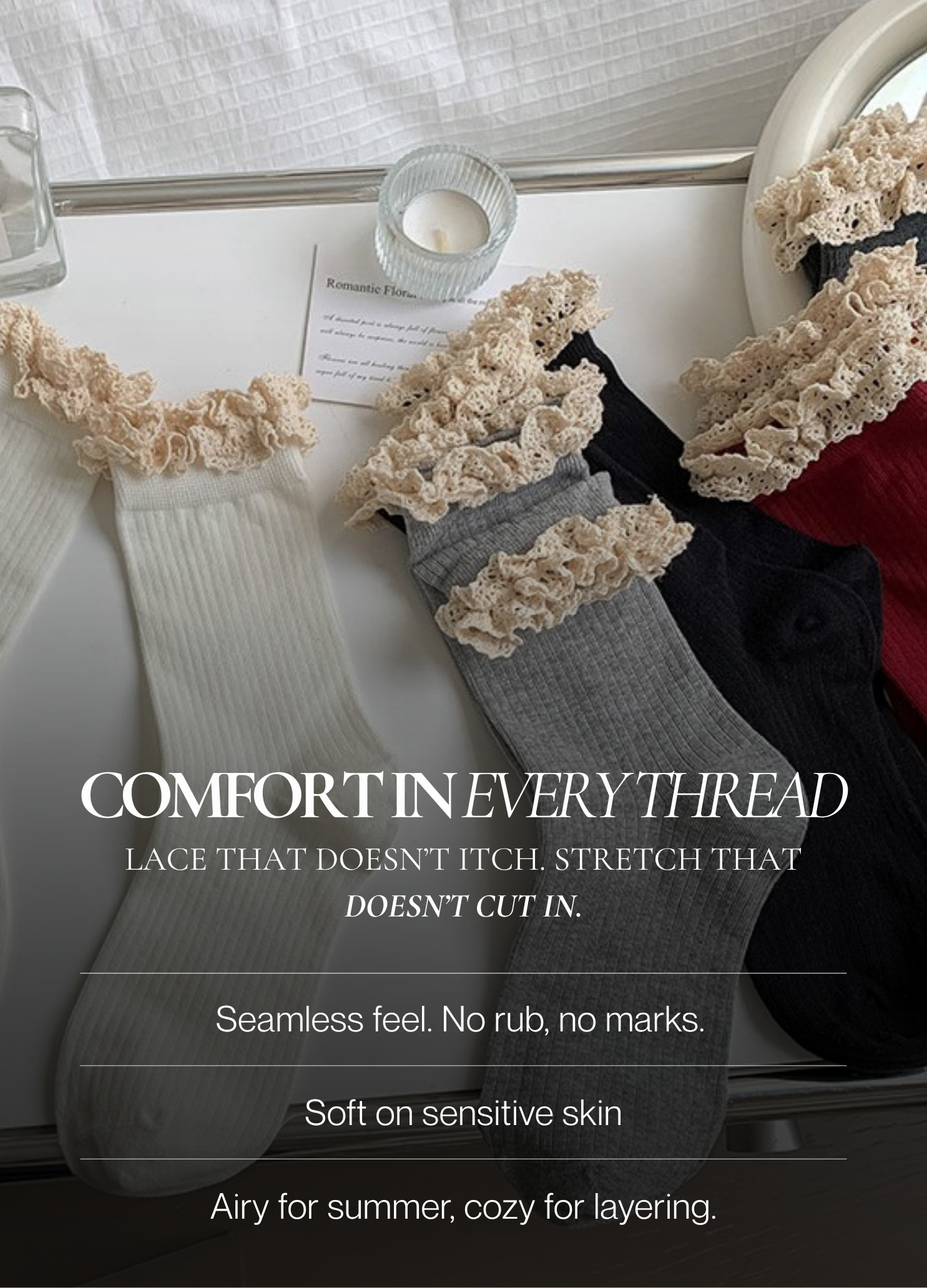 Flat lay of ribbed lace-trim socks in ivory, grey, black, and red, featuring frilly cream ruffle edges on a white surface.